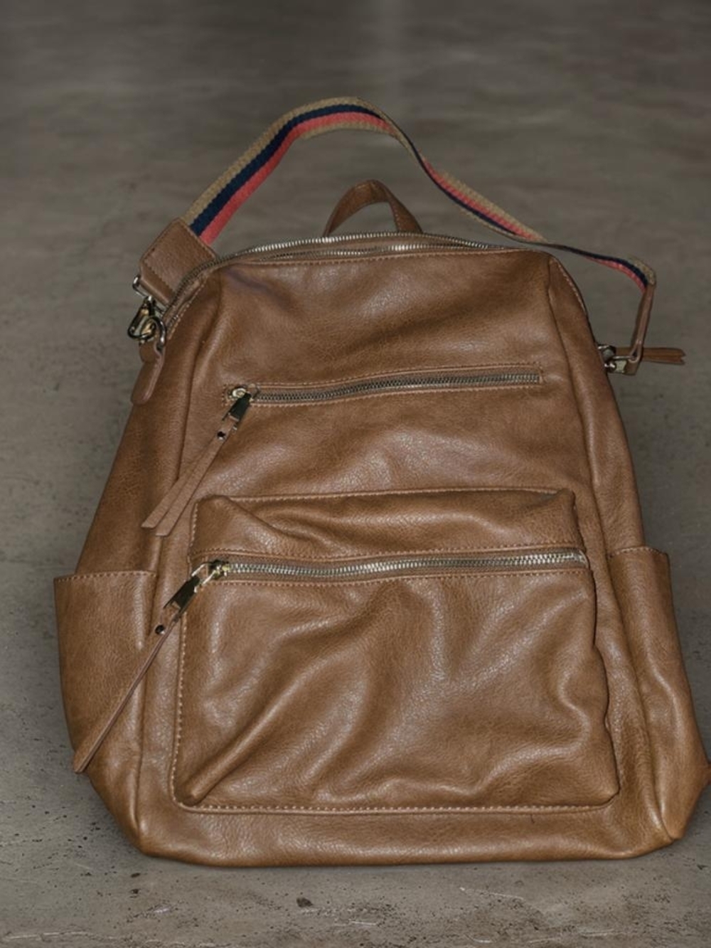 Brown Leather Backpack with Striped Shoulder Strap